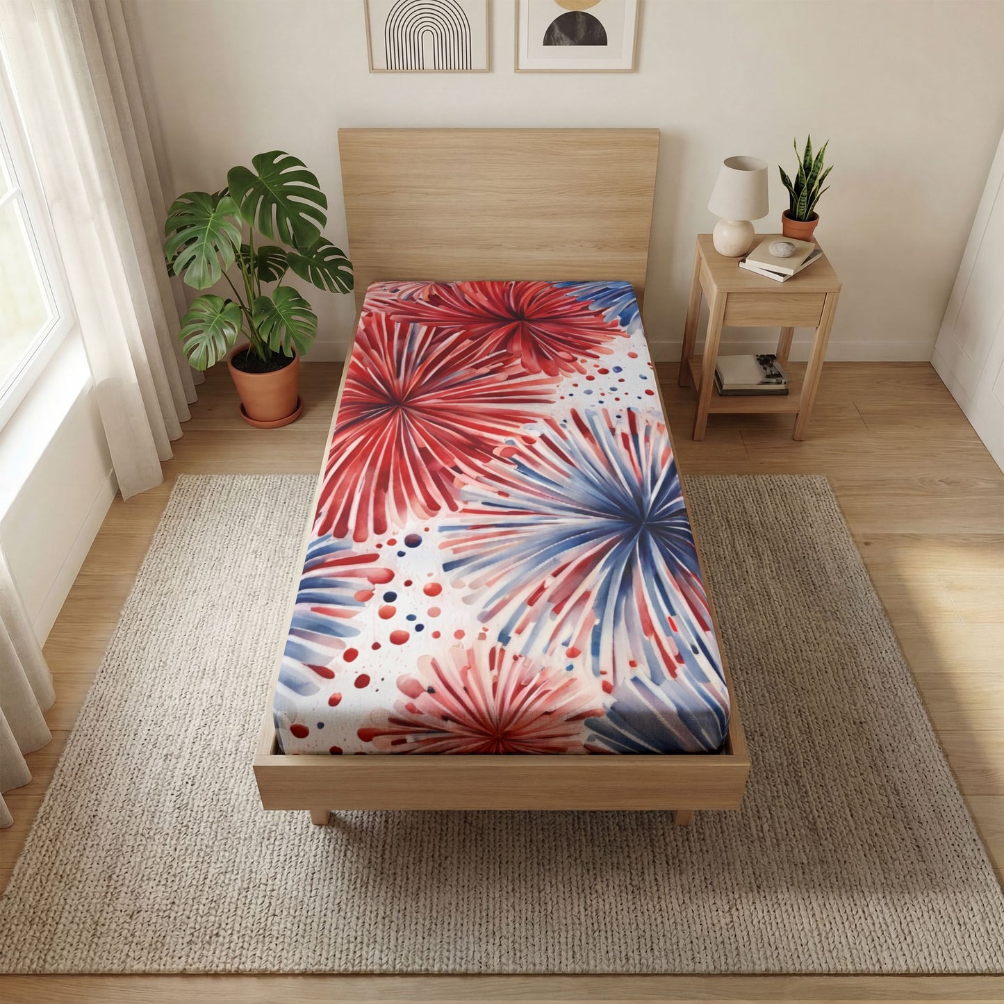 Bed with a colorful floral-patterned bedspread in a bright room with plants and a side table.