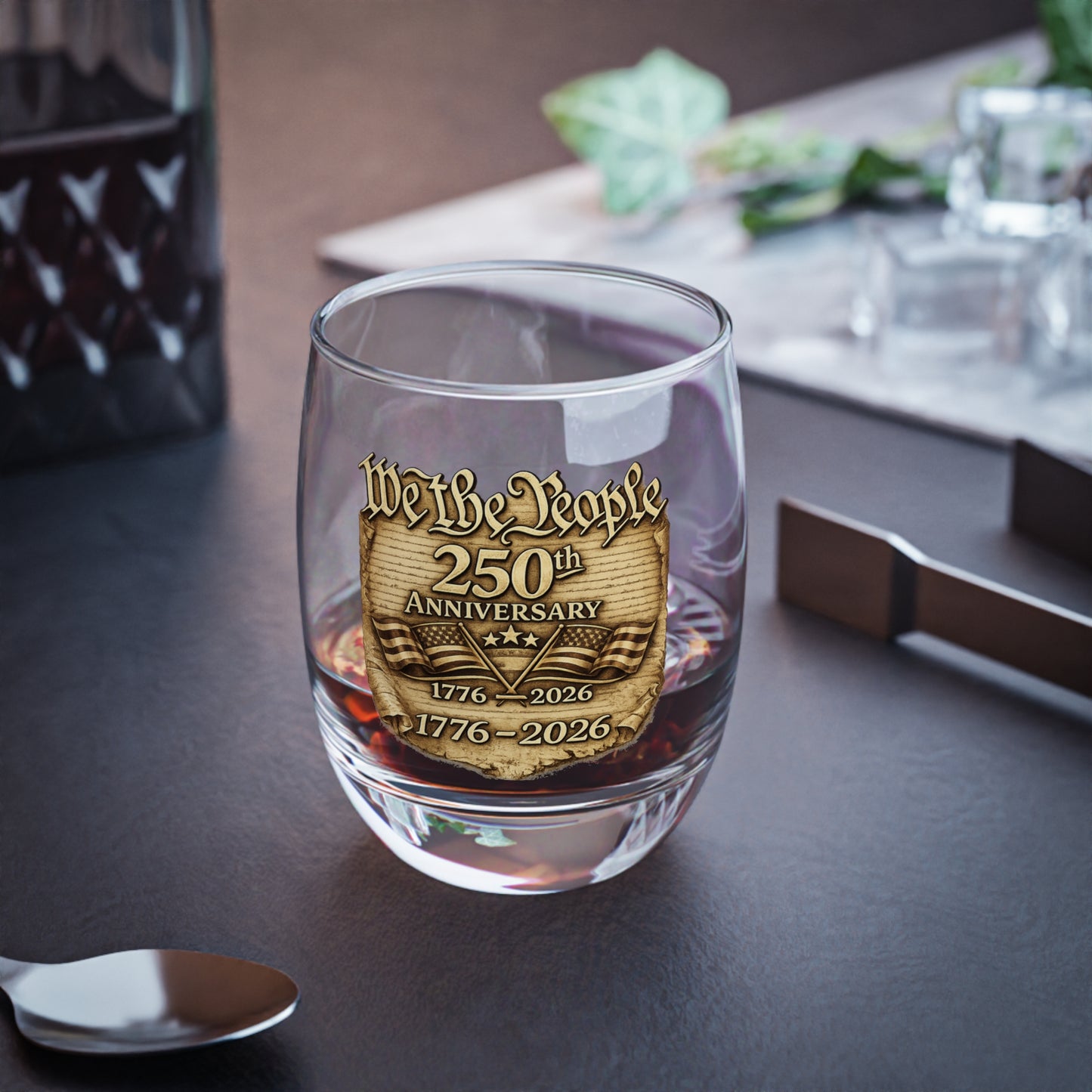 Whiskey Glass with 'We the People' 250th Anniversary design on a table