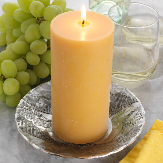 Pittsburgh Skyline Small Round Belmont Bowl by Wendell August Forge — shown as a candle holder