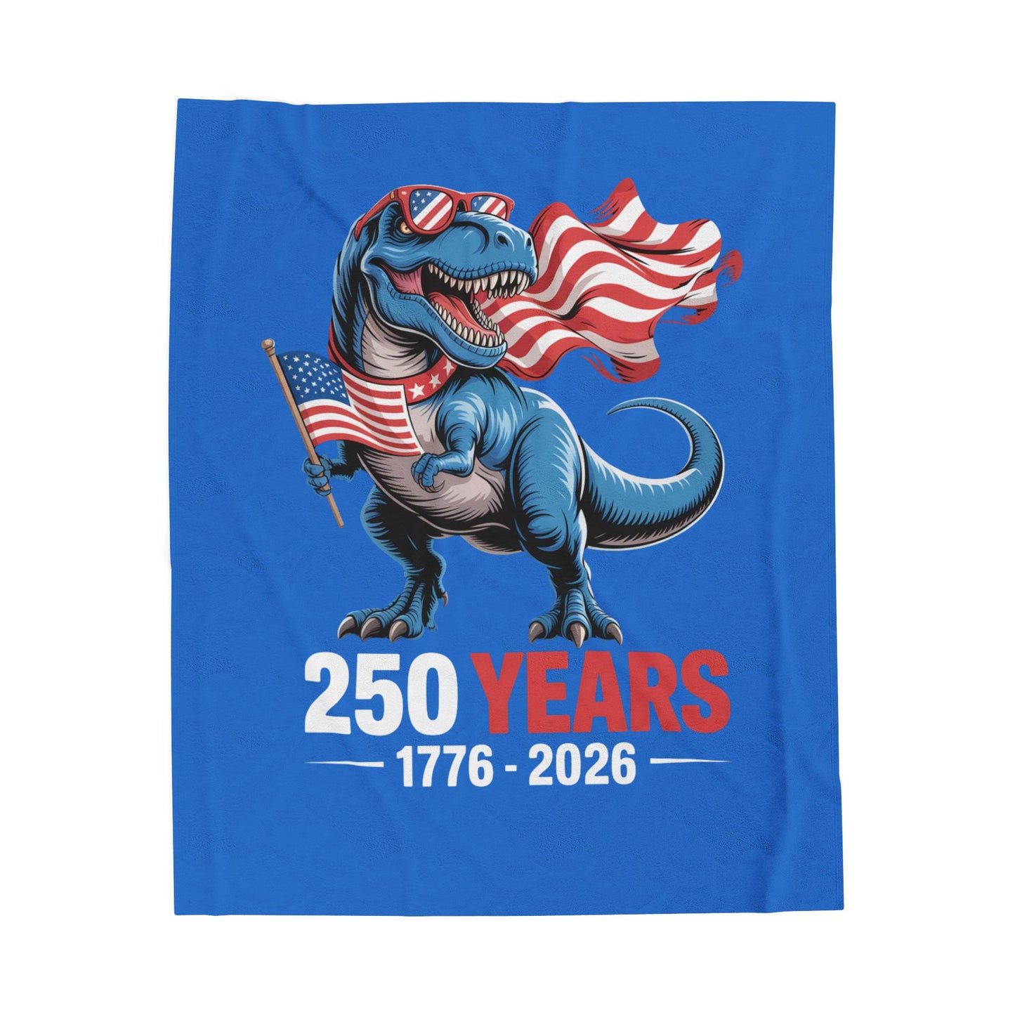 Blue blanket with a playful dinosaur holding American flags and '250 Years 1776-2026' text