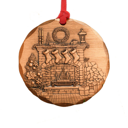 Wooden Christmas 2026 ornament with a fireplace design and red string hanger on a white background