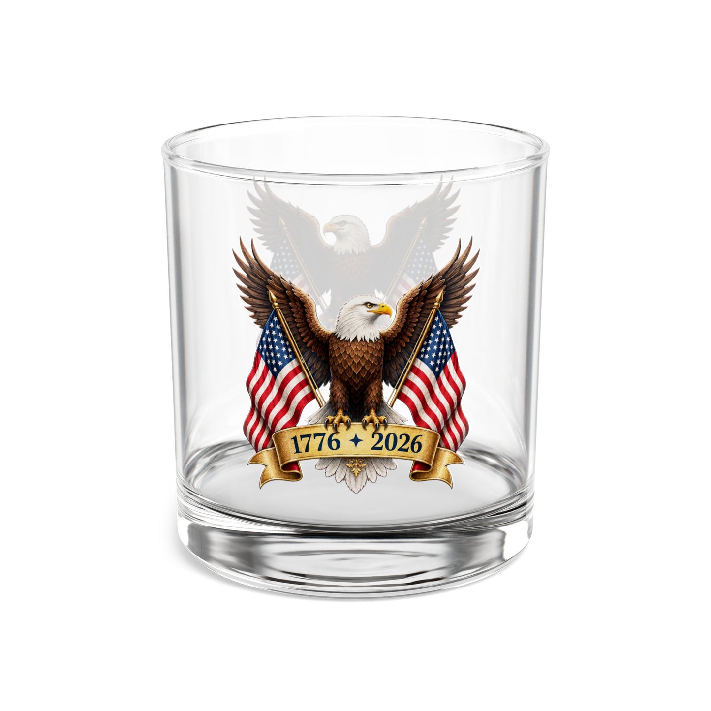 Clear whiskey glass with an eagle and American flag design on a white background