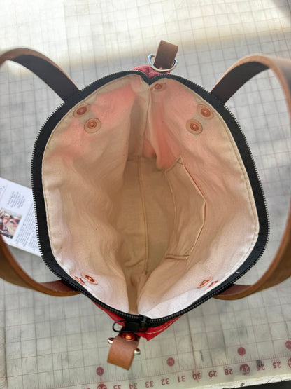 Interior view of Charcoal Engineer Burn Bag showing full lining and multiple interior pockets.