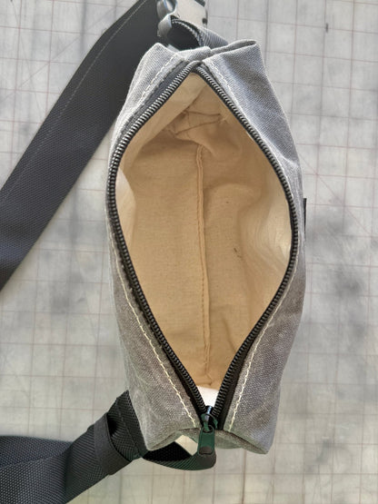 Interior view of Navy Fanny Pack showing lining and storage space.