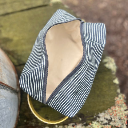 Interior view of Hickory Striped Pouch showing full lining and space for small essentials.