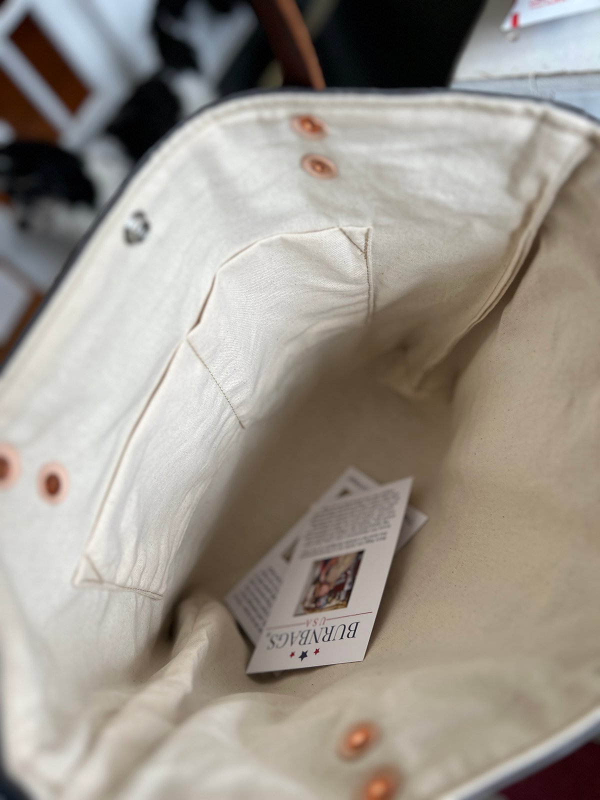 Interior of Chapel Hill Classic Burn Bag showing full lining and Burn Bags brand tag.