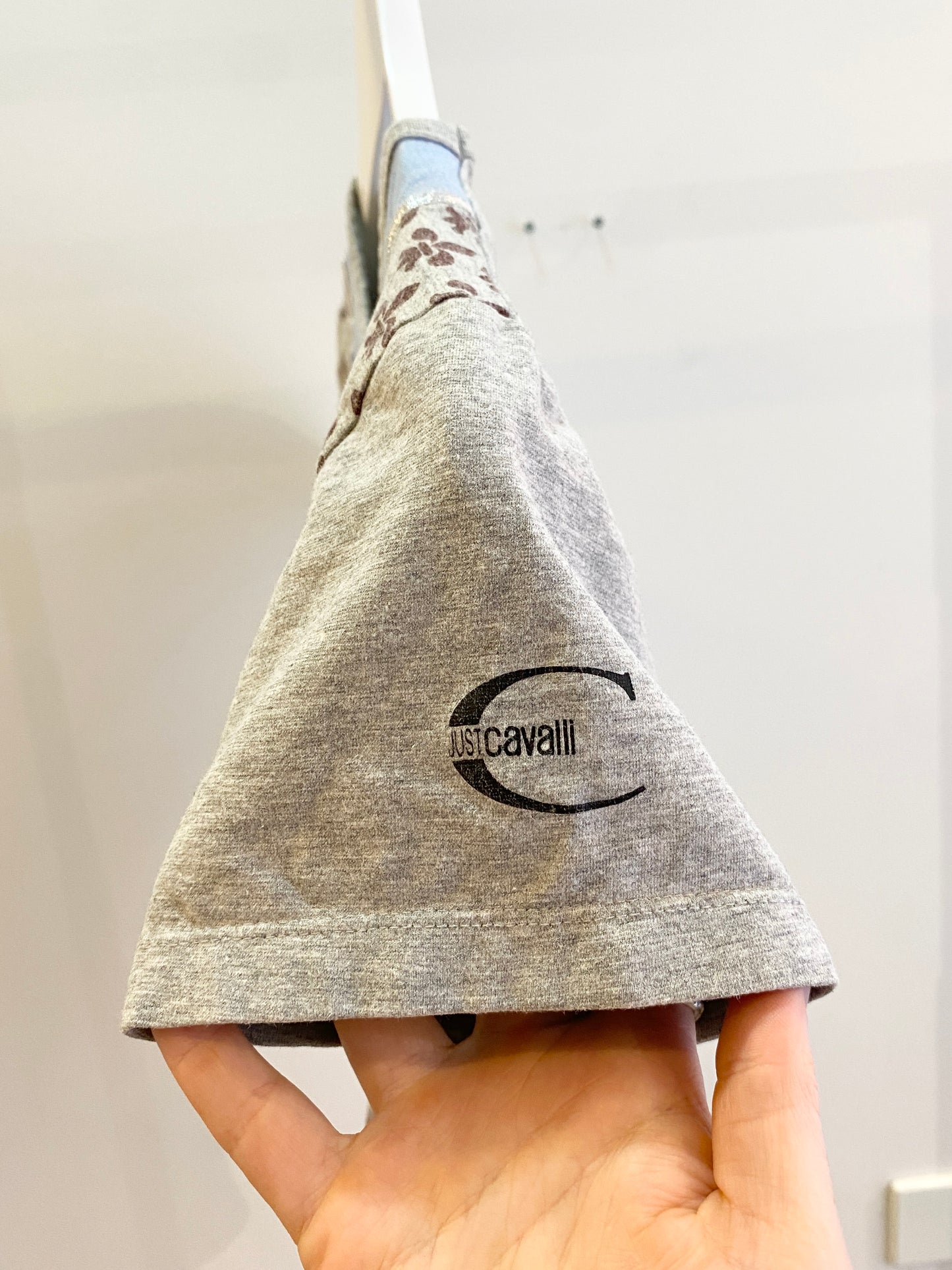 Authenticity card showing fire hose origin attached to interior of Burn Bag.