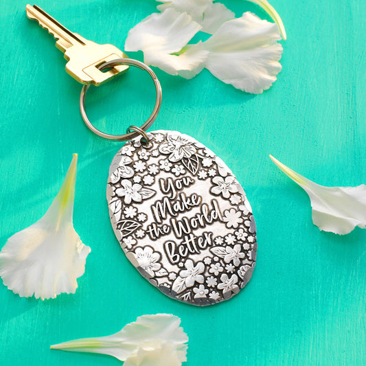 You Make the World Better Keychain by Wendell August Forge — angled view