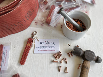 Fire Hose Key Chain made from decommissioned hose with metal key ring. 