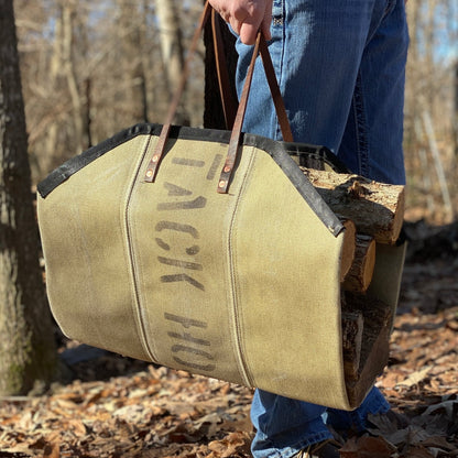 Fire Hose Wood Carrier loaded with firewood to demonstrate size and strength.